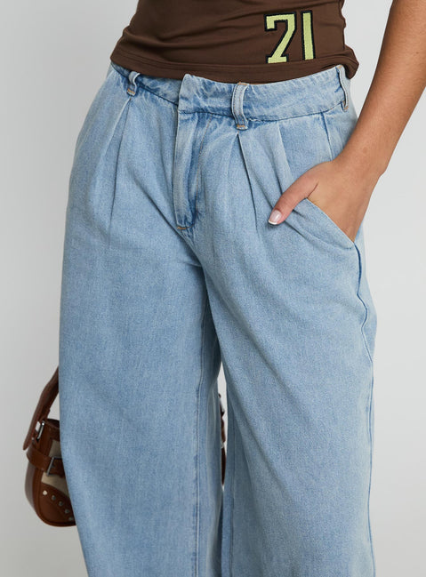 back view of model wearing Princess Polly Siloh Wide Leg Denim Jeans Blue Mid Rise Jeans 