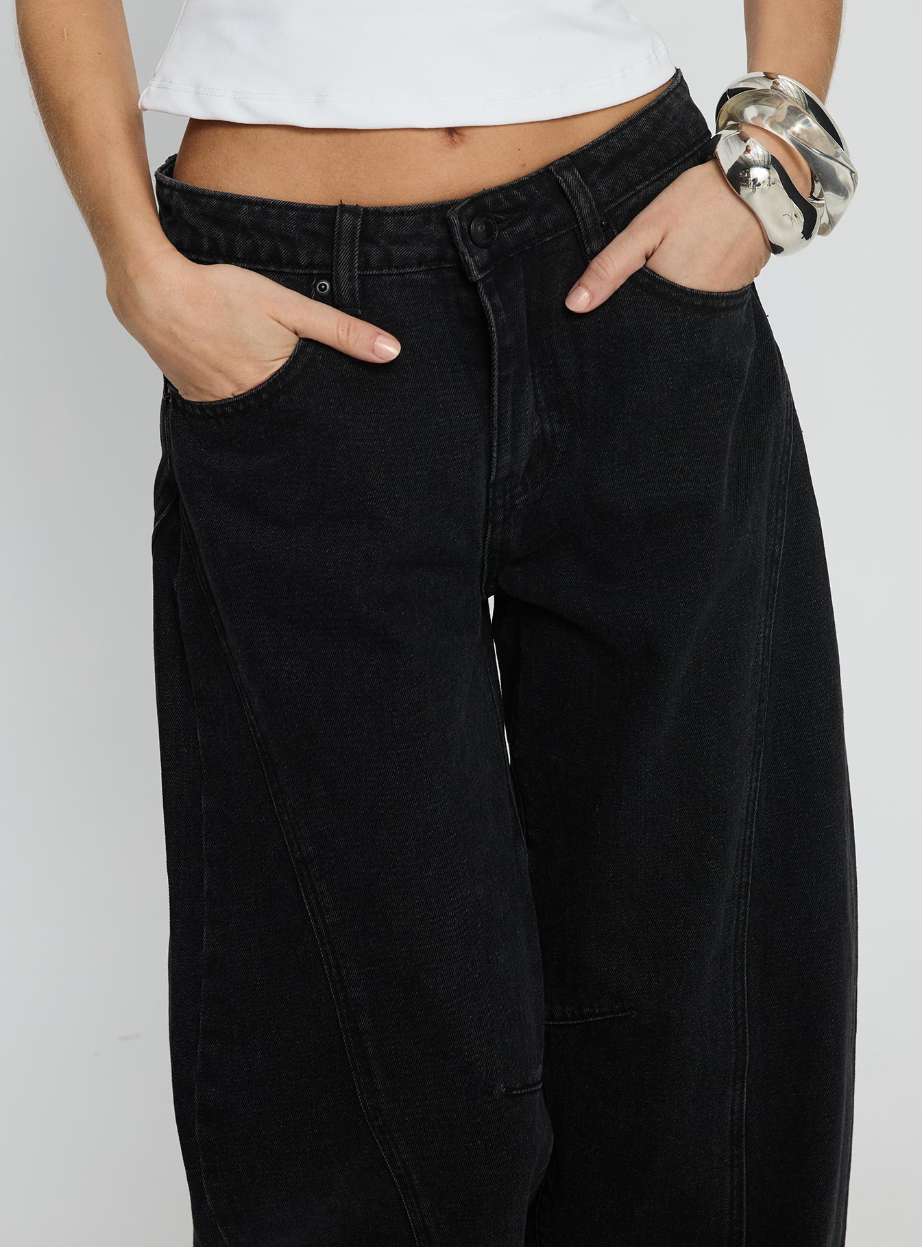back view of model wearing Princess Polly Lost Track Mid Rise Barrel Leg Jeans Washed Black Mid Rise Jeans 