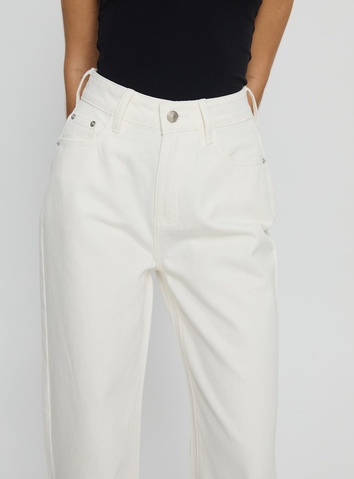 side view of model wearing Princess Polly Henesey High Rise Straight Leg Jeans White Wash High Waisted Jeans 