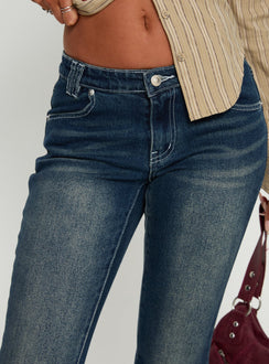 side view of model wearing Princess Polly Zilvia Bootleg Mid Rise Jeans Raw Denim Mid Rise Jeans 
