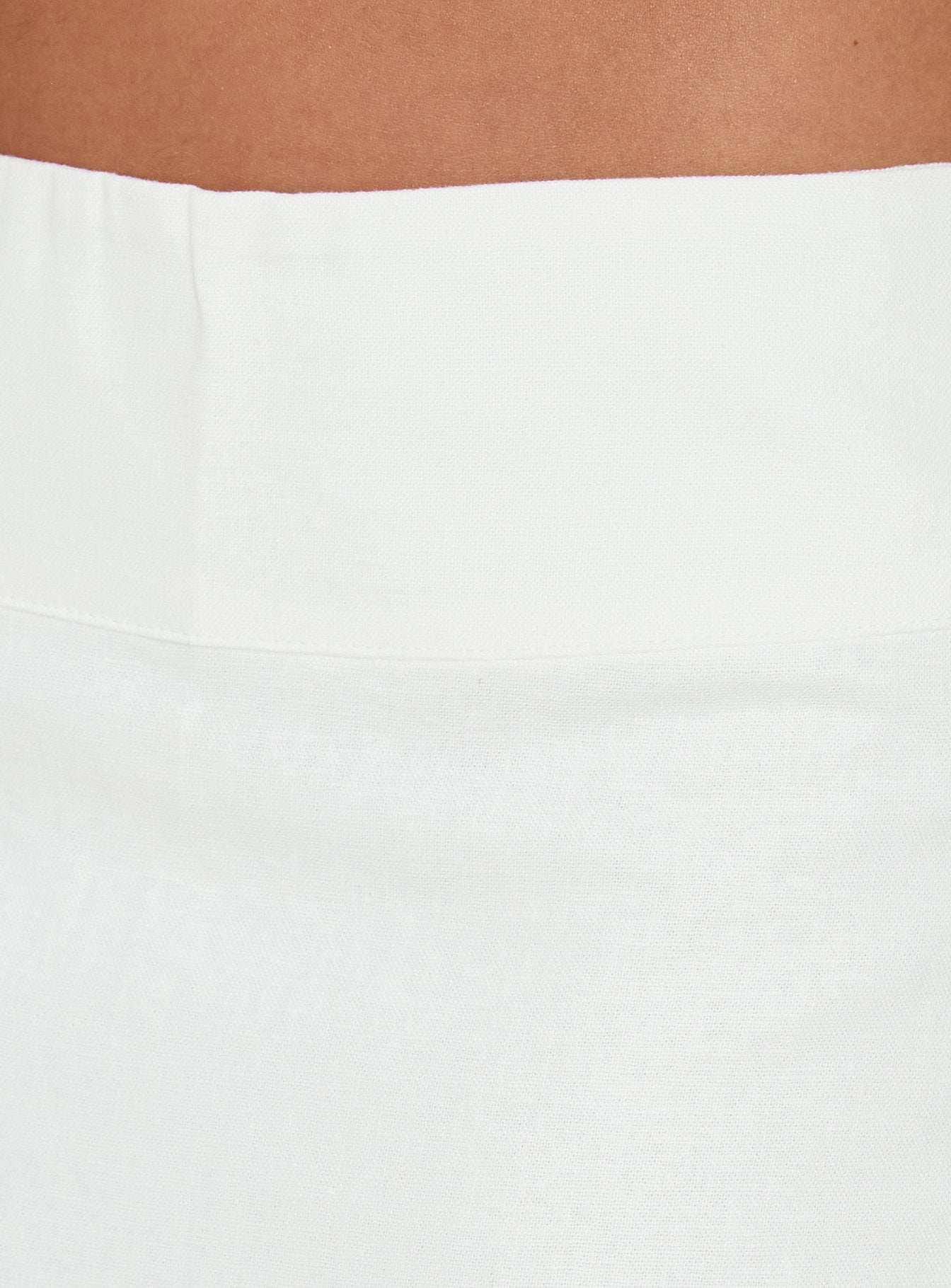 Showcasing the Such Delight Linen Midi Skirt in white for womens-skirts, designed with a fitted aline silhouette Princess Polly