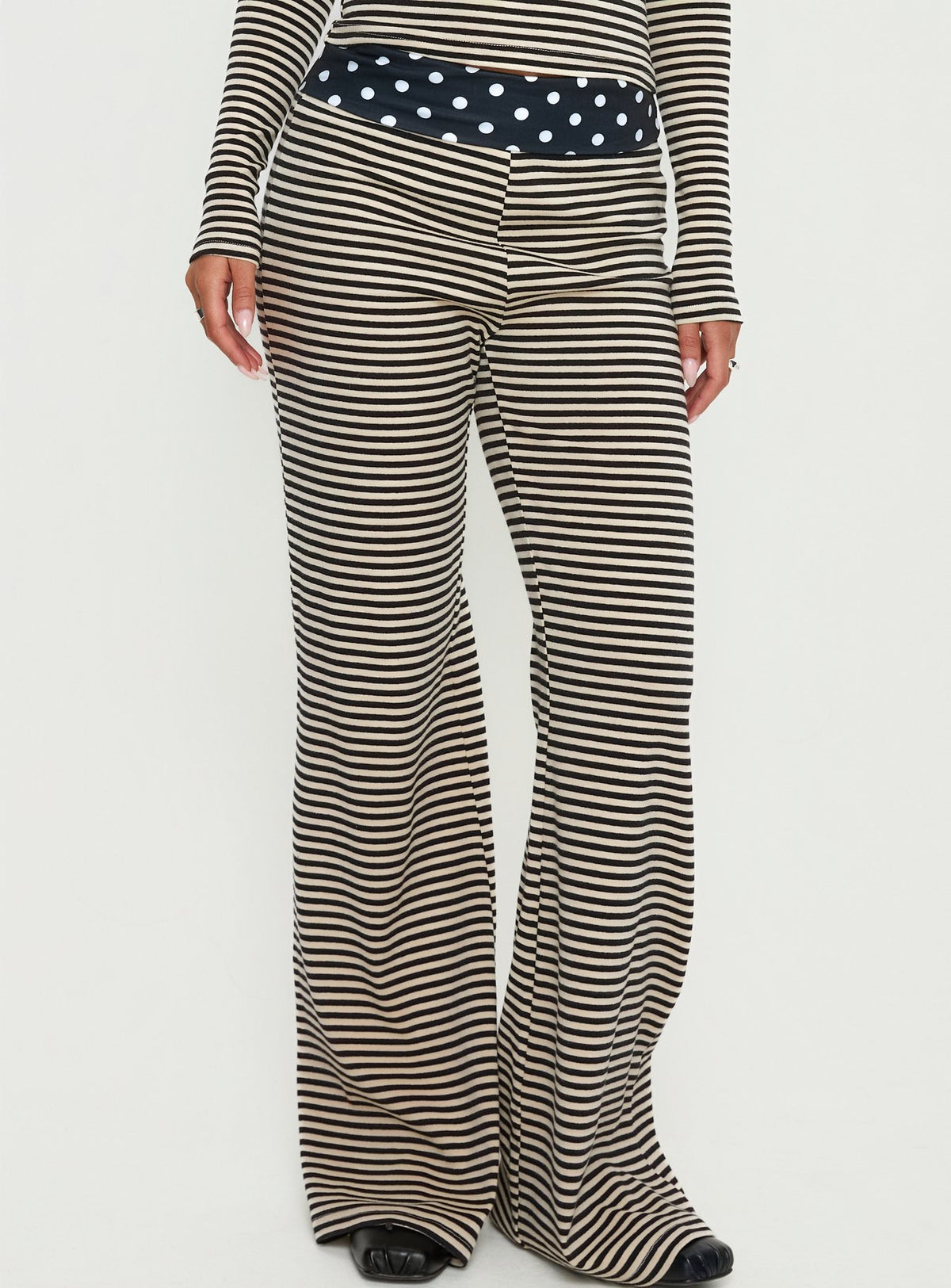 front view of model wearing Princess Polly Virenna Fold Over Pants Black Multi Mid Rise Pants 