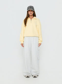 side view of model wearing Princess Polly Rozanna 1/4 Zip Jumper Butter Cropped Jumpers 