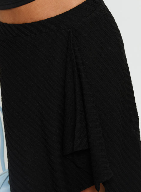   side view of model wearing Princess Polly Esmeray Midi Knit Skirt Sheer Black Skirts 