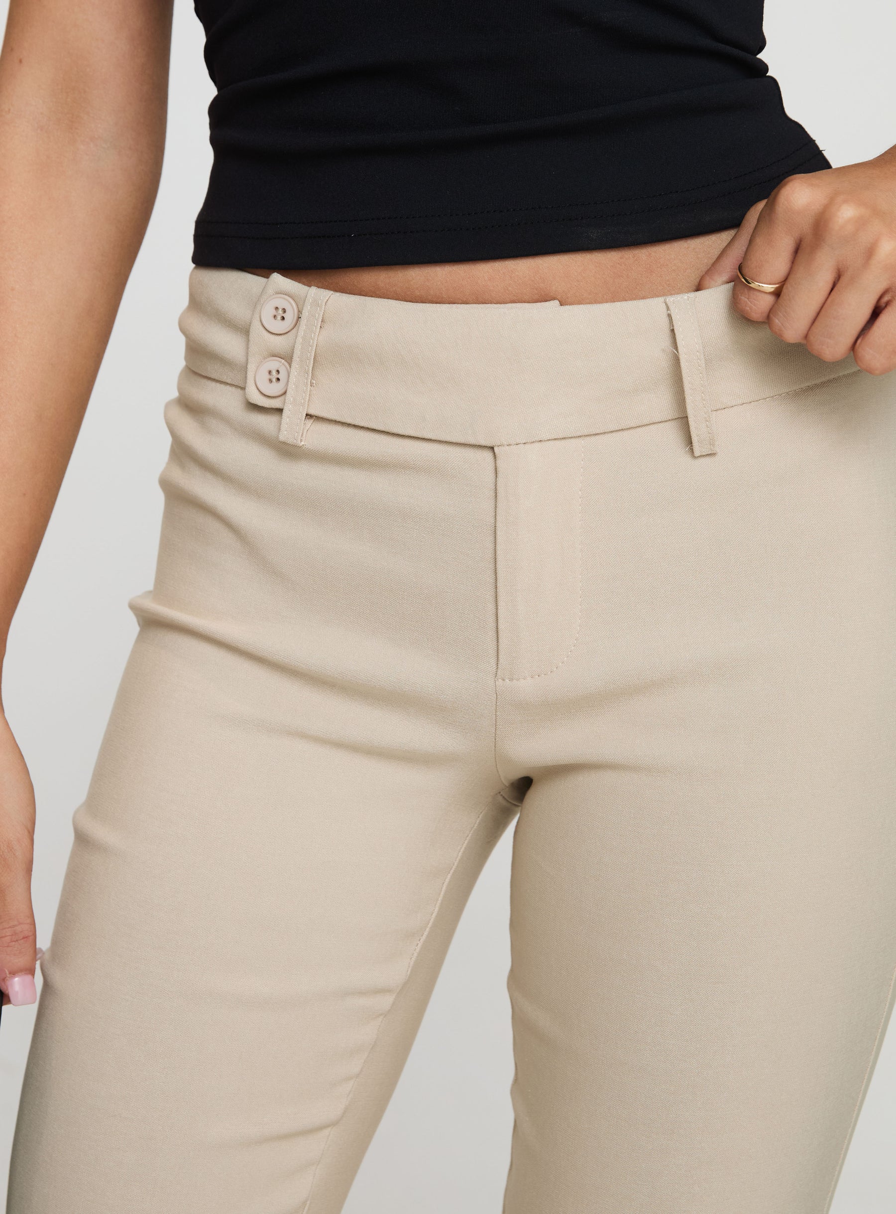 back view of model wearing Princess Polly Kinkirk Flared Pants Taupe Petite 