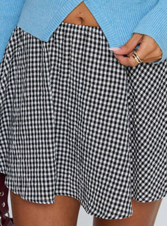 back view of model wearing Princess Polly Sohogirl Flowy Mini Skirt Black / White Gingham Mini Skirts 