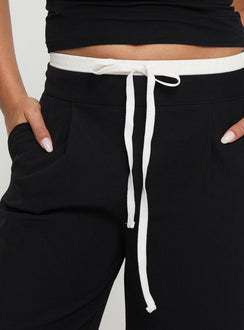 back view of model wearing Princess Polly Burna Pants Black High Waisted Pants 