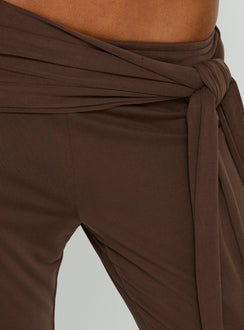 back view of model wearing Princess Polly Katiana Wrap Jersey Pants Brown Mid Rise Pants 