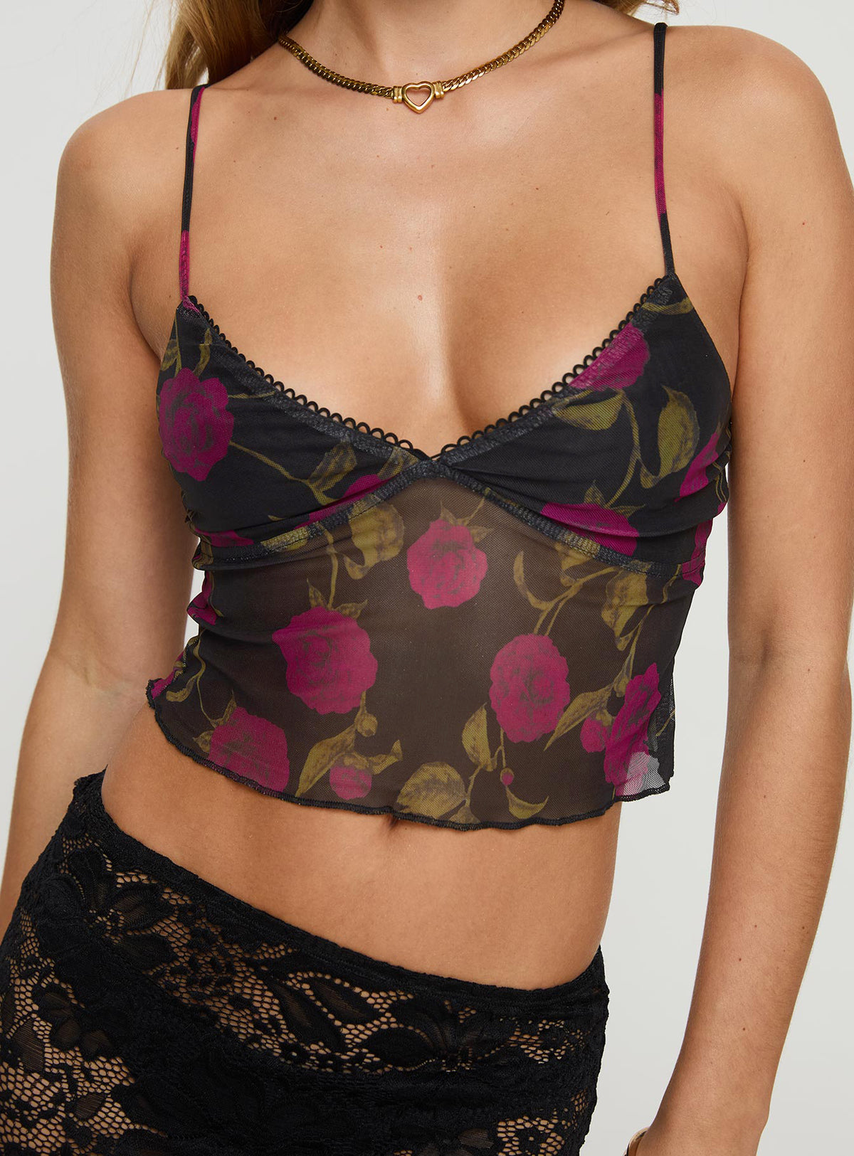 front view of model wearing Princess Polly Raphalee Top Black / Red Floral Sleeveless Plunger 