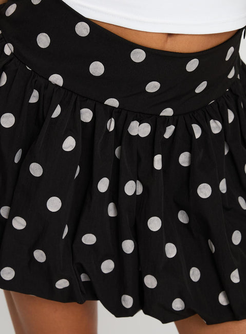 back view of model wearing Princess Polly Quintessa Bubble Hem Mini Skirt Black / White Skirts 