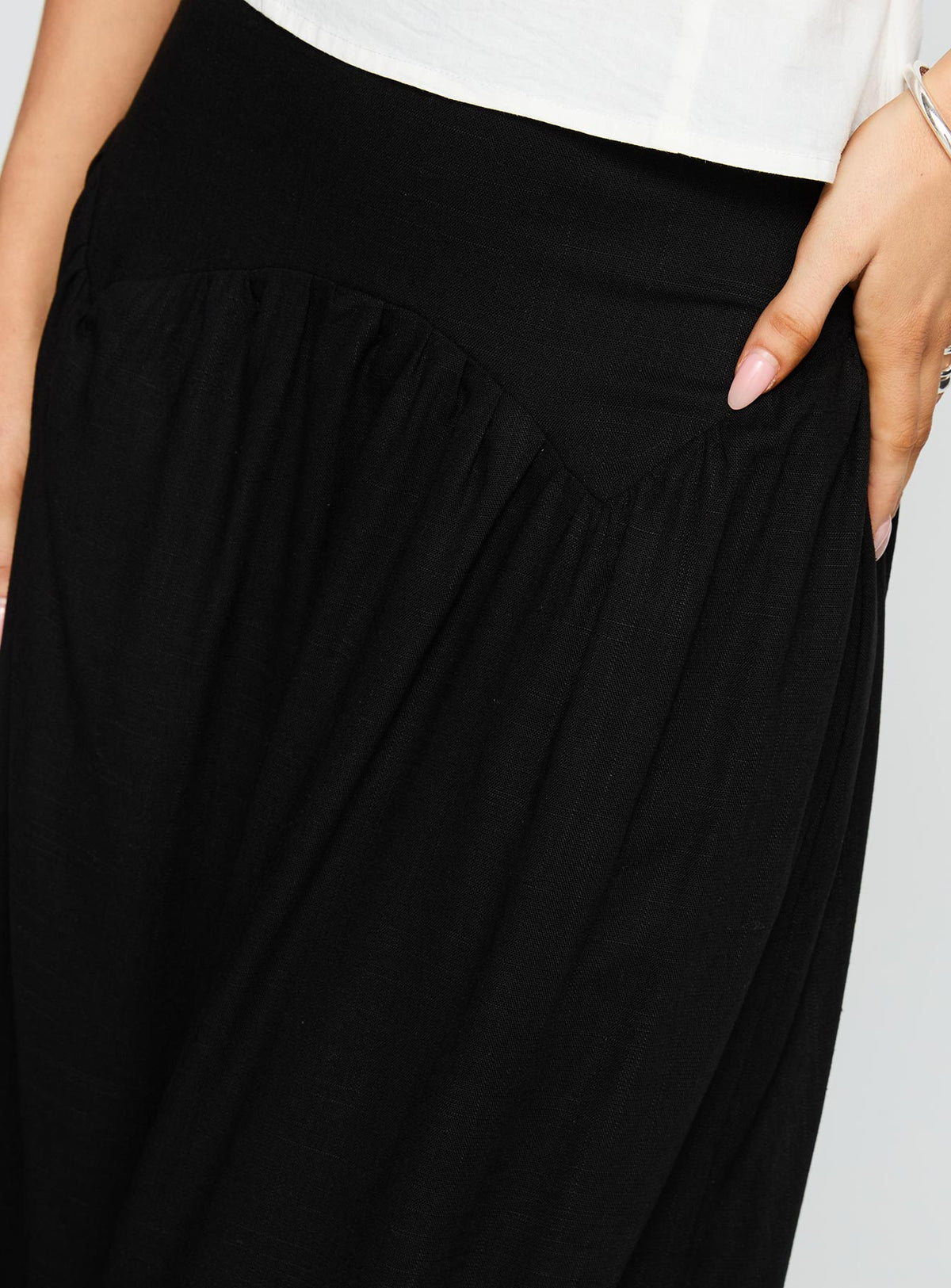 back view of model wearing Princess Polly Human Nurture Maxi Skirt Black Maxi 