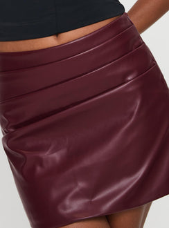 back view of model wearing Princess Polly Kalilah Faux Leather Mini Skirt Red Mini Skirts 