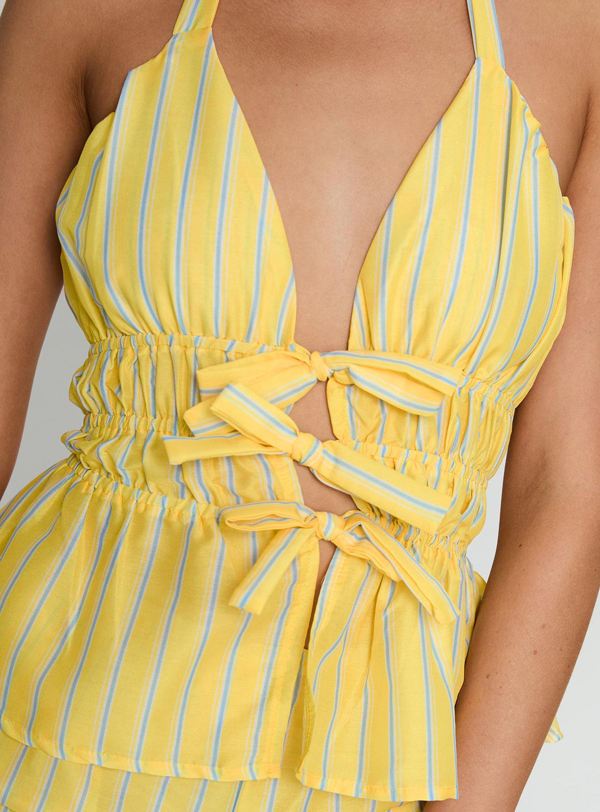 back view of model wearing Princess Polly Delicacy Tie Detail Top Yellow Stripe Sleeveless Plunger 