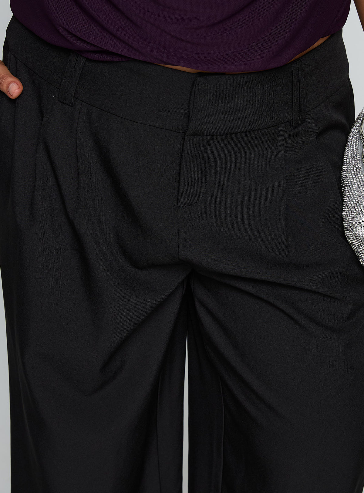 side view of model wearing Princess Polly Two Lovers Low Rise Pants Black Curve Low Rise Pants 
