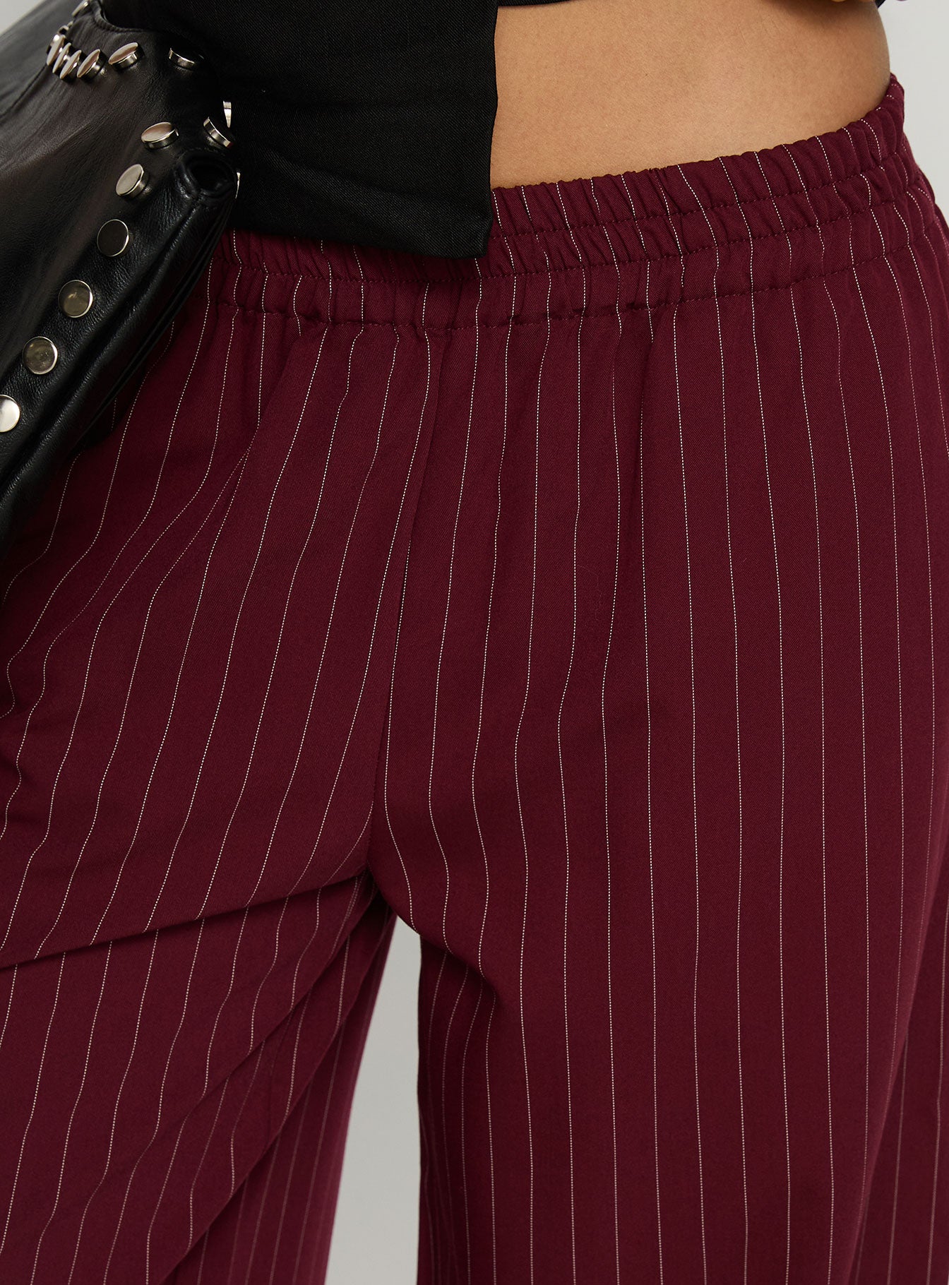 back view of model wearing Princess Polly Jaysa Baggy Wide Leg Pant Burgundy Pinstripe Mid Rise Pants Pants 