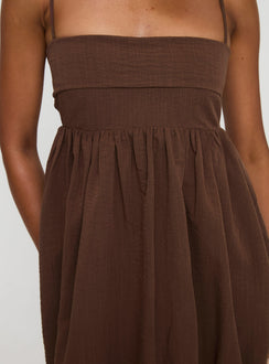back view of model wearing Princess Polly Layken Bubble Hem Mini Dress Chocolate Petite Square Neck 