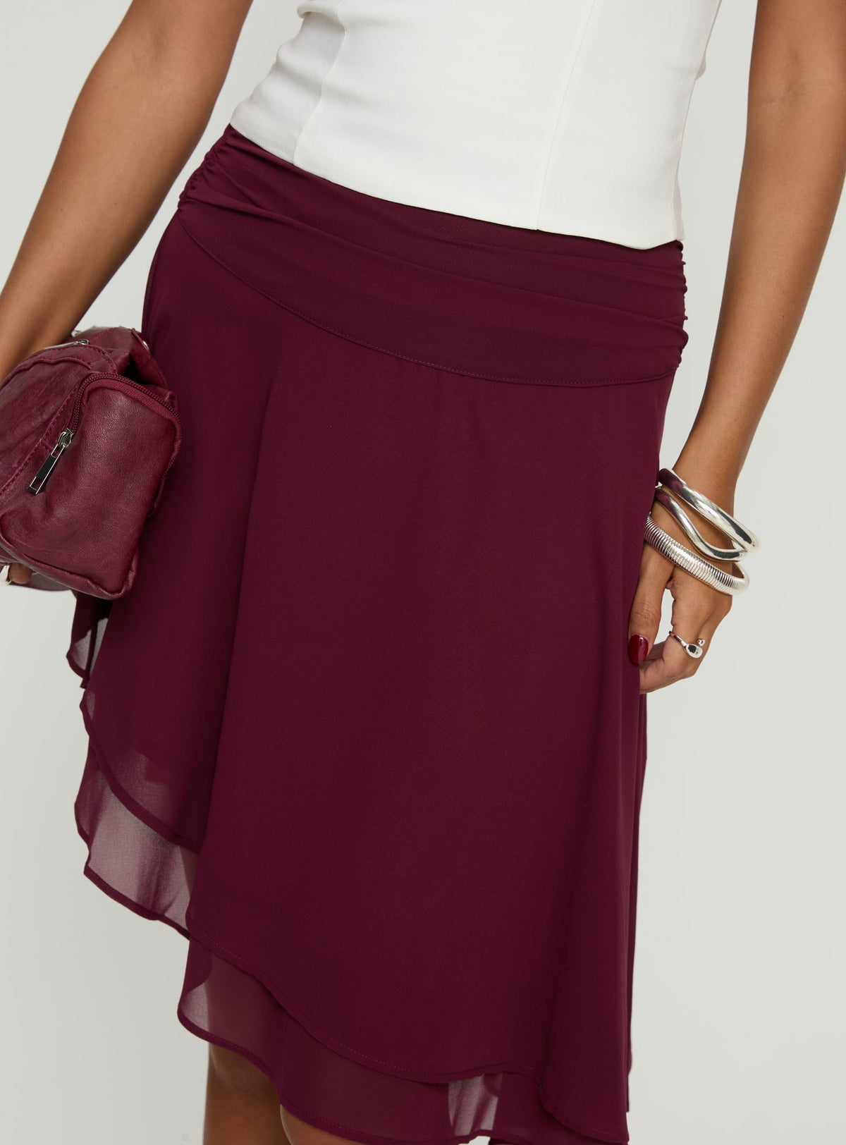 back view of model wearing Princess Polly Evanescence Asymmetrical Midi Skirt Cherry 