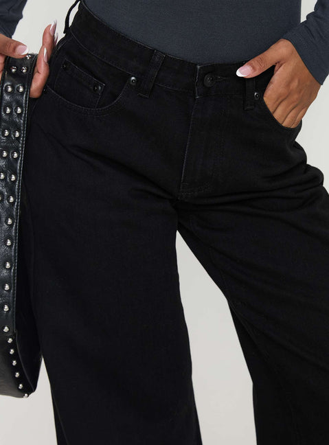 back view of model wearing Princess Polly Colemane Mid Rise Denim Jeans Black High Waisted 