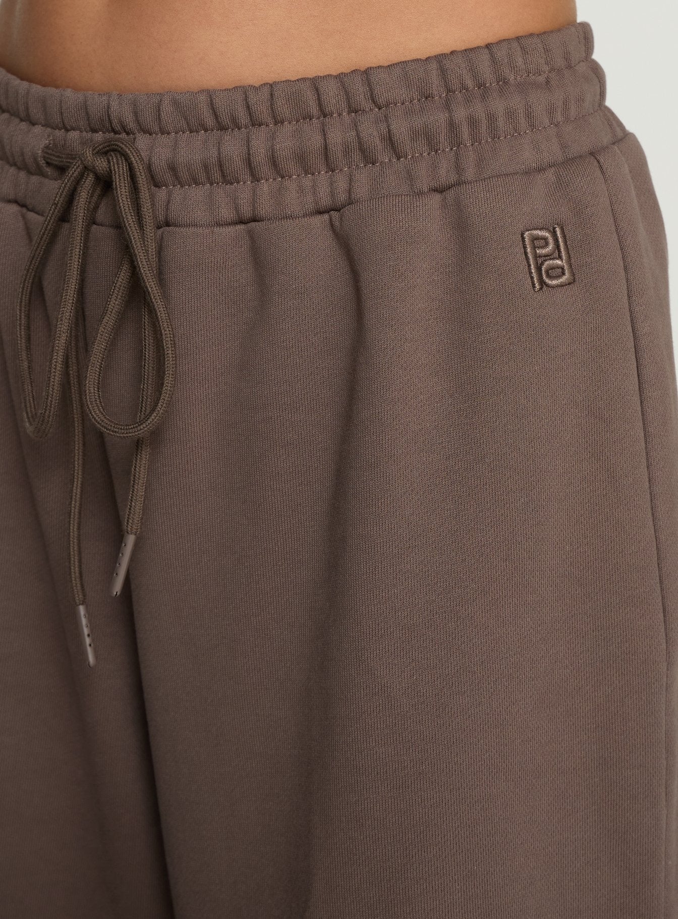 back view of model wearing Princess Polly All Day Straight Leg Sweatpants Mocha Mid Rise Pants 