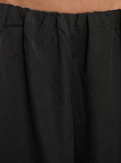 side view of model wearing Princess Polly Odara Wide Leg Pants Black Low Rise Pants 