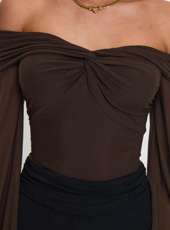 Explore the Babette Off The Shoulder Bodysuit in Brown womens-bodysuit with full sleeves and ruched design on-body view of model wearing