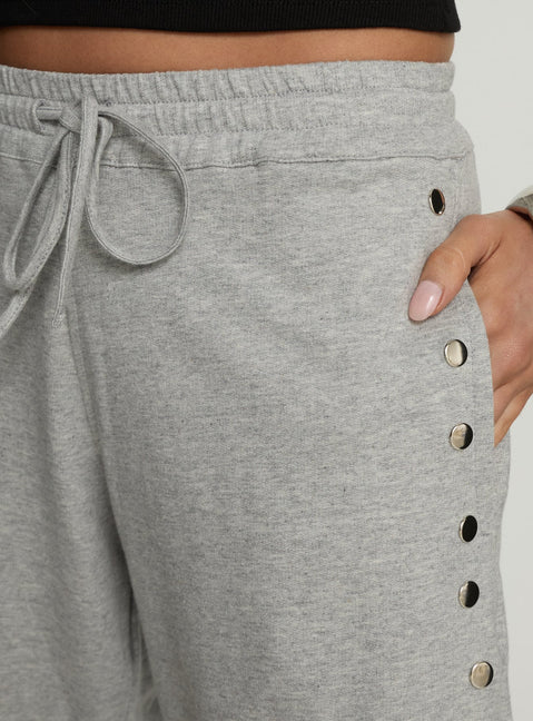 back view of model wearing Princess Polly Kether Longline Basketball Studs Short Grey Marle Mid Rise Pants 