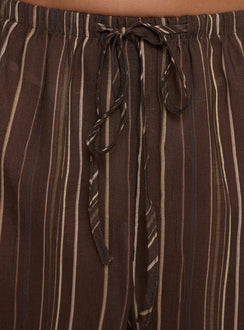 front view of model wearing Princess Polly Parklea Pants Brown Multi High Rise Pants 
