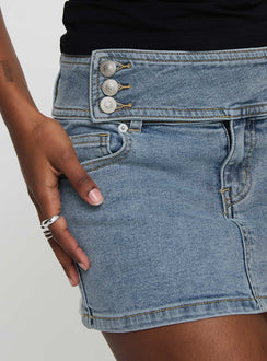 back view of model wearing Princess Polly Brinkman Mini Skirt Light Wash Denim Mini Skirts 