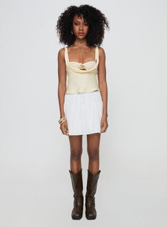  side view of model wearing Princess Polly Cherry On Top Mini Skirt White Mini Skirts Skirts 