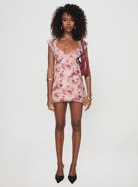 side view of model wearing Princess Polly Trigg Mini Dress Pink Floral Plunger 