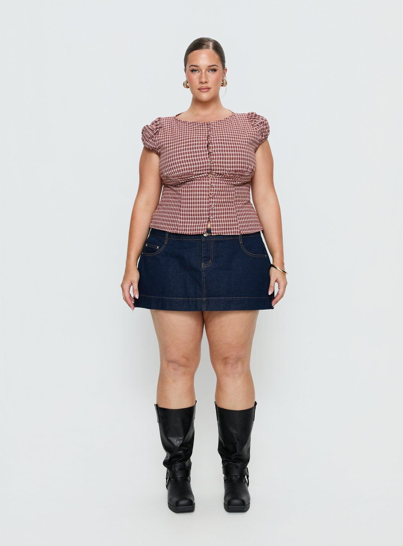 back view of model wearing Princess Polly Warna Low Rise Denim Mini Skirt Dark Wash Curve Mini Skirts 