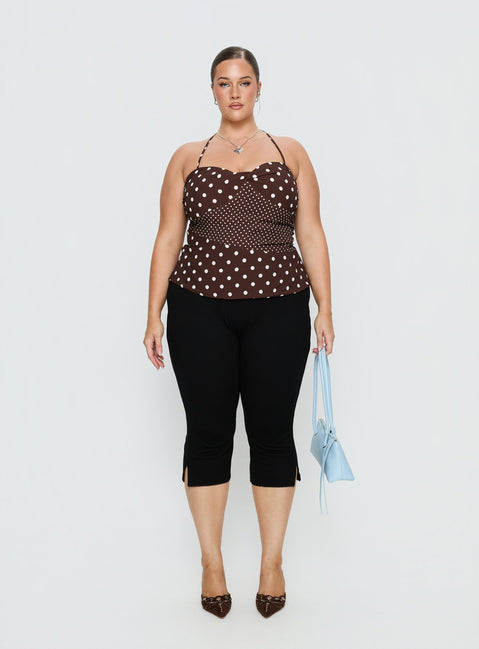 front view of model wearing Princess Polly Baseline Rib Capri Pants Black Curve Mid Rise Pants 