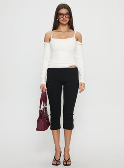front view of model wearing Princess Polly Baseline Rib Capri Pants Black Petite Mid Rise Pants 