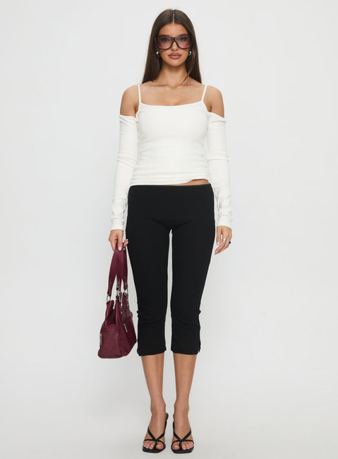 front view of model wearing Princess Polly Baseline Rib Capri Pants Black Petite Mid Rise Pants 