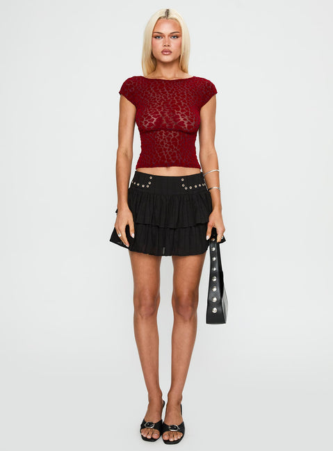   side view of model wearing Princess Polly Fire Sign Studded Tiered Mini Skirt Black Mini Skirts 