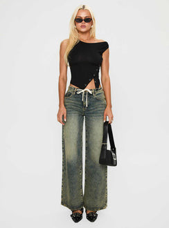 side view of model wearing Princess Polly Mellowed Out Slouchy Jeans Antique Wash Mid Rise 