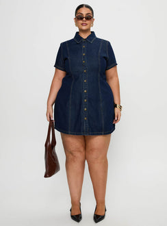 front view of model wearing Princess Polly Perception Denim Mini Dress Mid Wash Curve V-Neck 