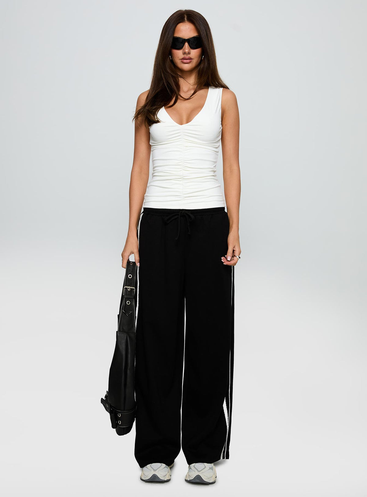 front view of model wearing Princess Polly Loving Is Easy Ruched Top White Sleeveless V-Neck 