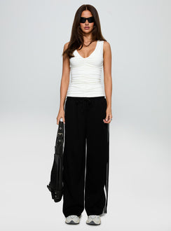 front view of model wearing Princess Polly Loving Is Easy Ruched Top White Sleeveless V-Neck 