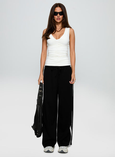 front view of model wearing Princess Polly Loving Is Easy Ruched Top White Sleeveless V-Neck 