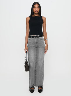 front view of model wearing Princess Polly Henesey Raw Hem Jeans Washed Grey High Waisted 