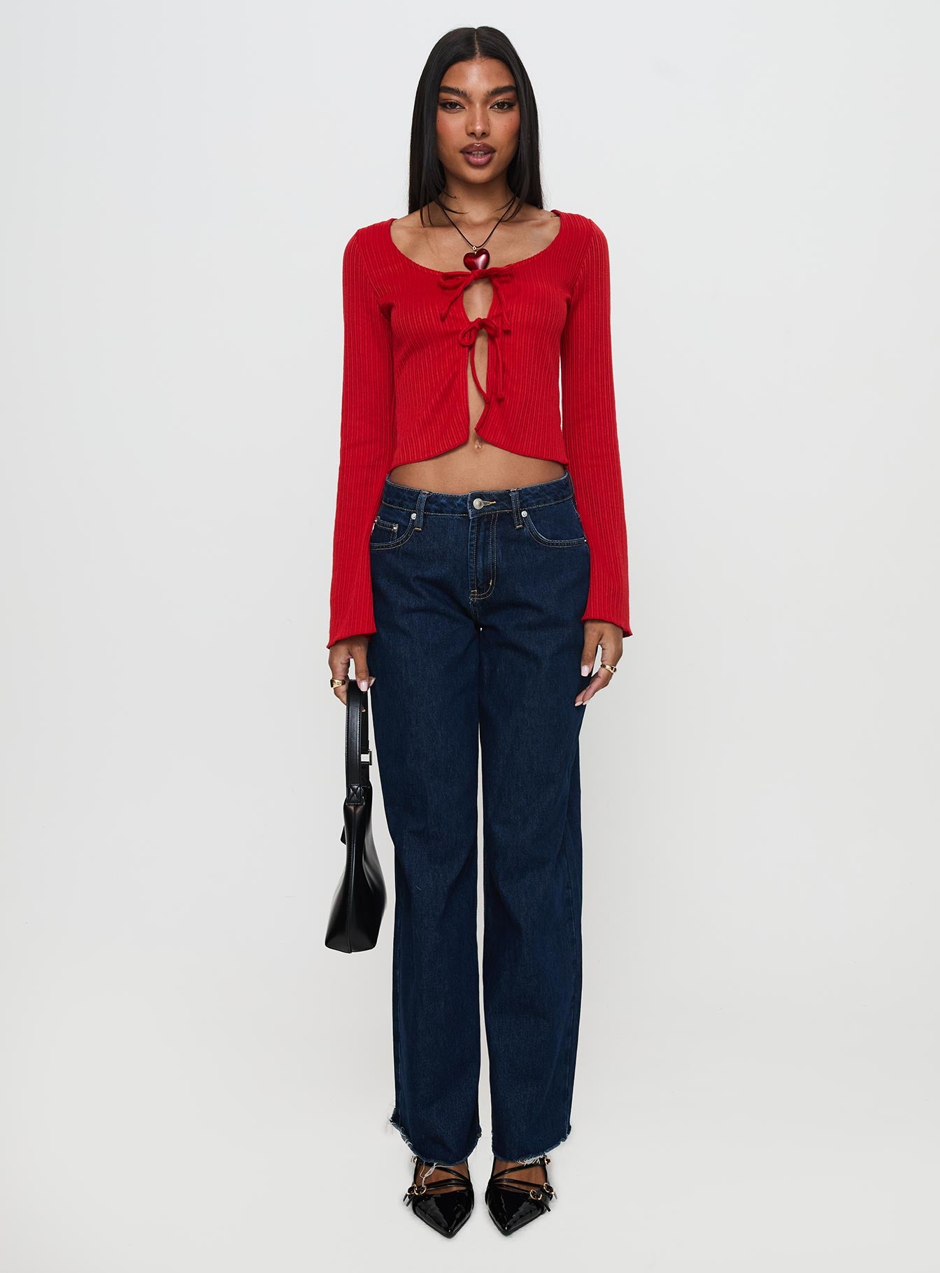 side view of model wearing Princess Polly Rowynne Long Sleeve Tie Up Top Red Full Sleeves Scoop Neck 