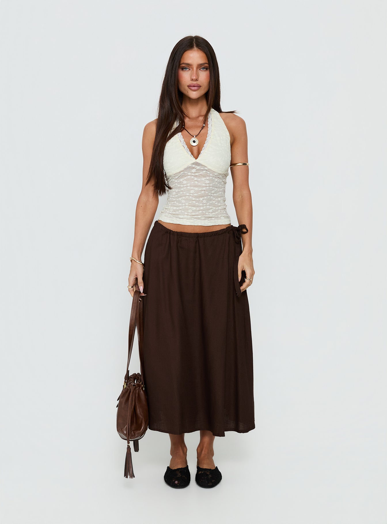   side view of model wearing Princess Polly Persuasion Tie Side Midi Skirt Chocolate Midi Skirts 