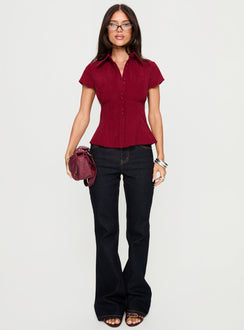 front view of model wearing Princess Polly Magic Mirror Mid Rise Bootleg Jeans Raw Indigo Mid Rise Jeans 
