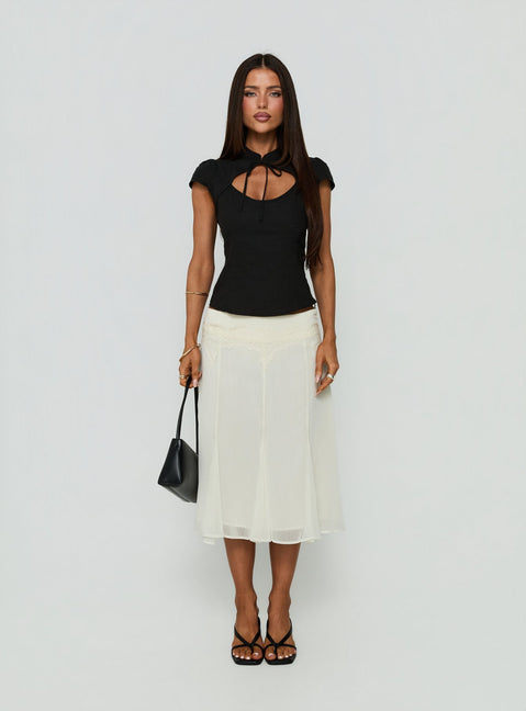 Showcasing the Ambrosea Panelled Midi Skirt Cream womens-skirts with midi length front view of model wearing Princess Polly