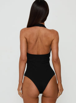 Designed with the Baseline Halter Bodysuit Black sleeveless womens bodysuit back view of model wearing Princess Polly