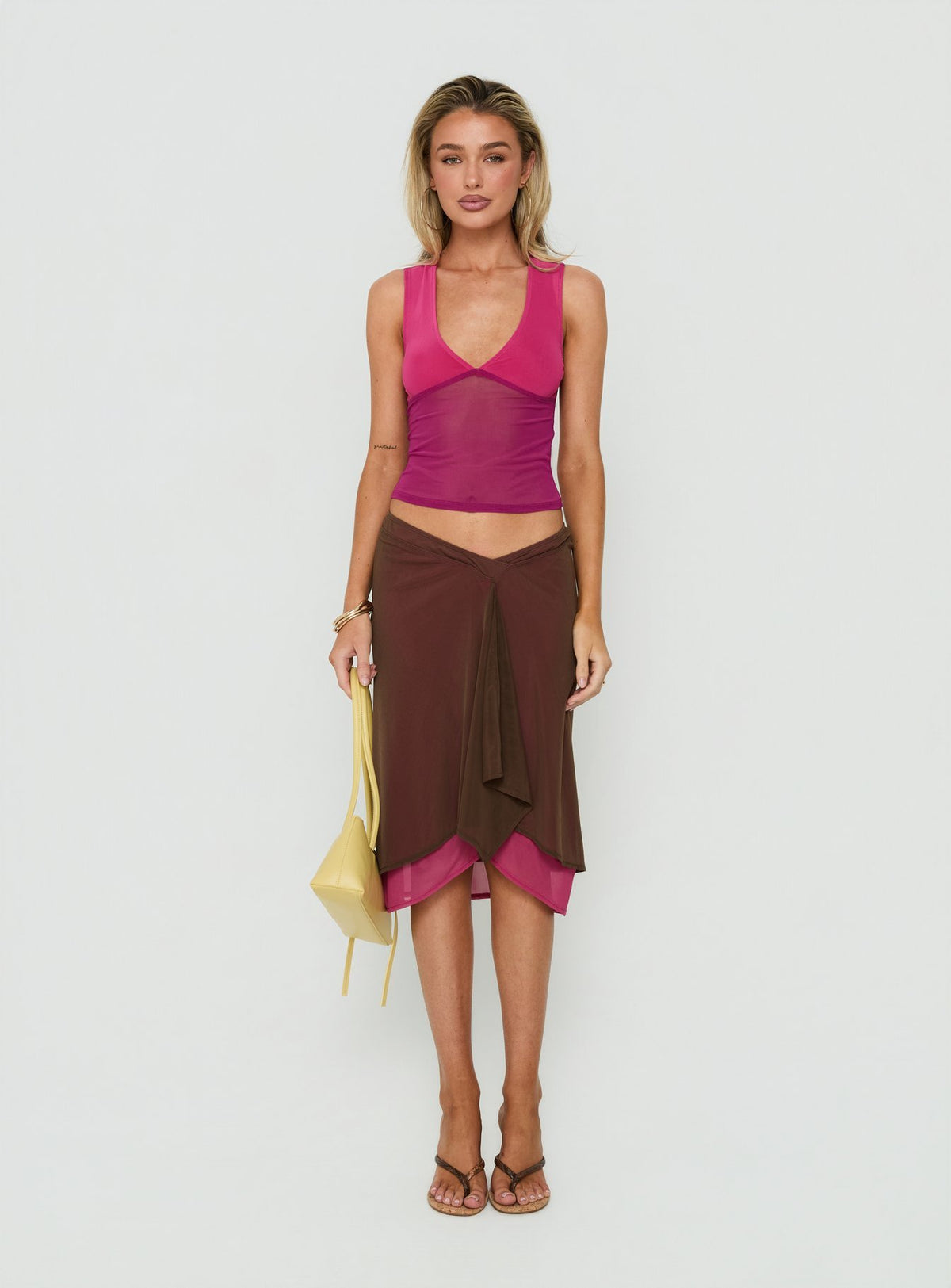 Discover the Erinhadi Midi Skirt Brown / Pink in womens-skirts with midi length front view of model wearing Princess Polly