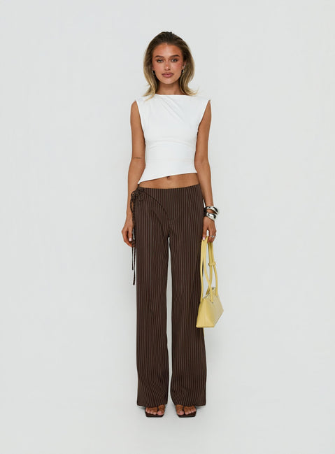 Crafted for style, the Editta Tie Detail Low Rise Tailored Pants Brown Pinstripe in womens-regular-pants with low-rise front view of model wearing