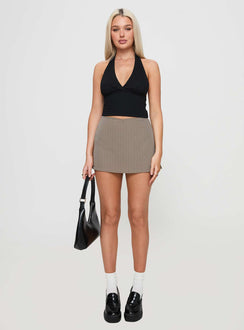 front view of model wearing Princess Polly Gigi Skort Beige Pinstripe High Waisted Shorts 