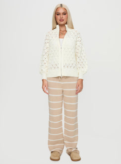 front view of model wearing Princess Polly Sirena Zip Through Knit Sweater Cream 